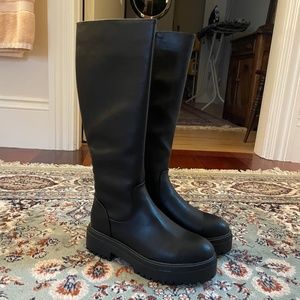 Black knee-high lug boots